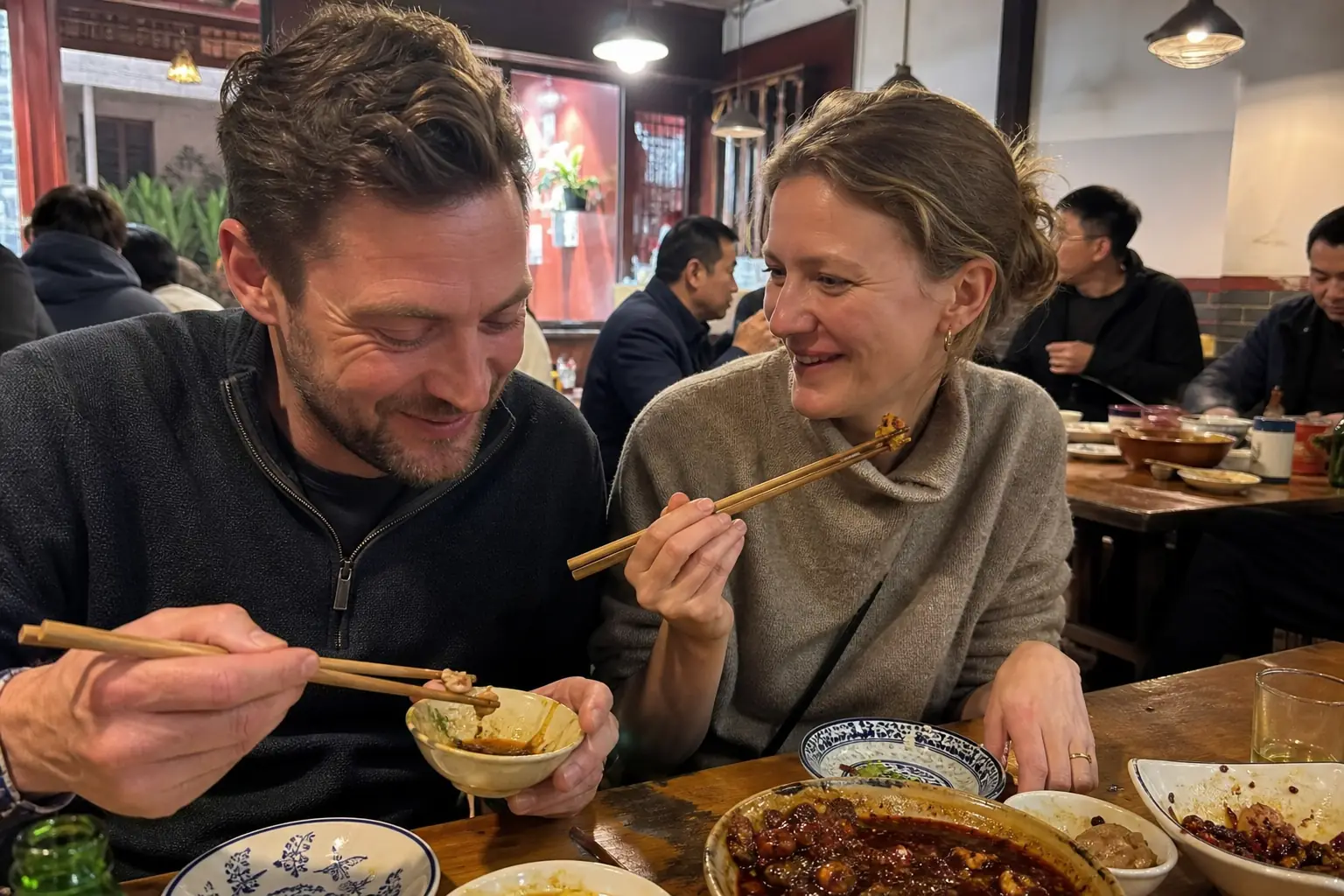 German travellers sharing regional food in Chengdu